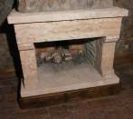 Fireplace in tartar stone and limestone argentoro.